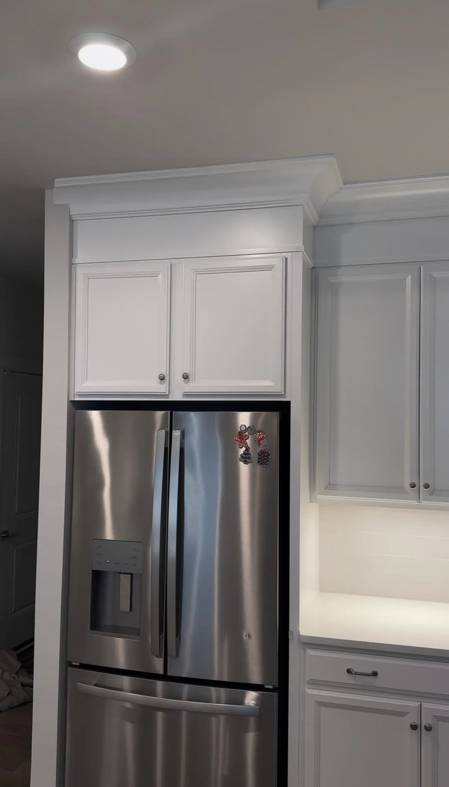 French door refrigerator and cabinet tower after West Chester kitchen renovation by ProBrothers